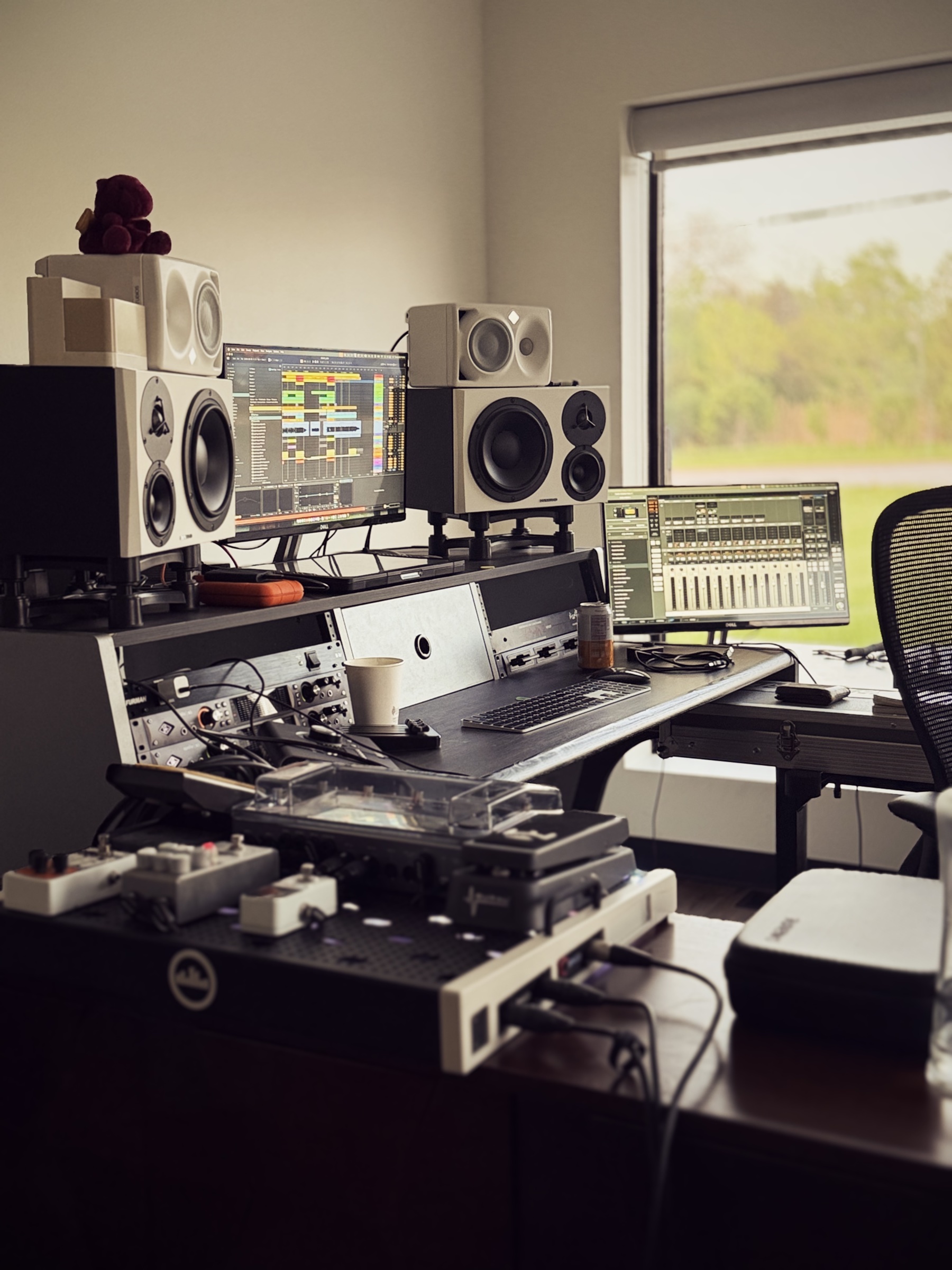 The current Kenwood Studios production room, with monitoring, recording gear, and mixing screens